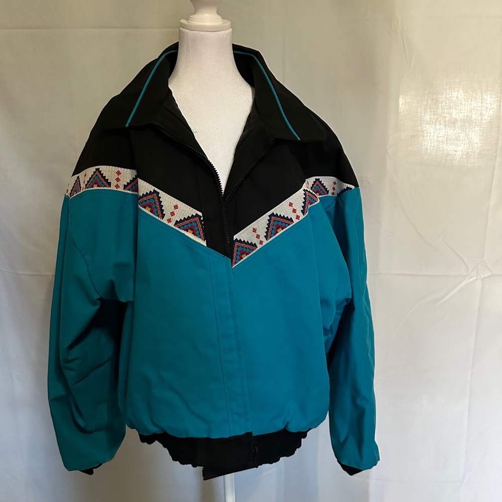 David James Sz XL turquoise and black with southwestern trim side, pockets,